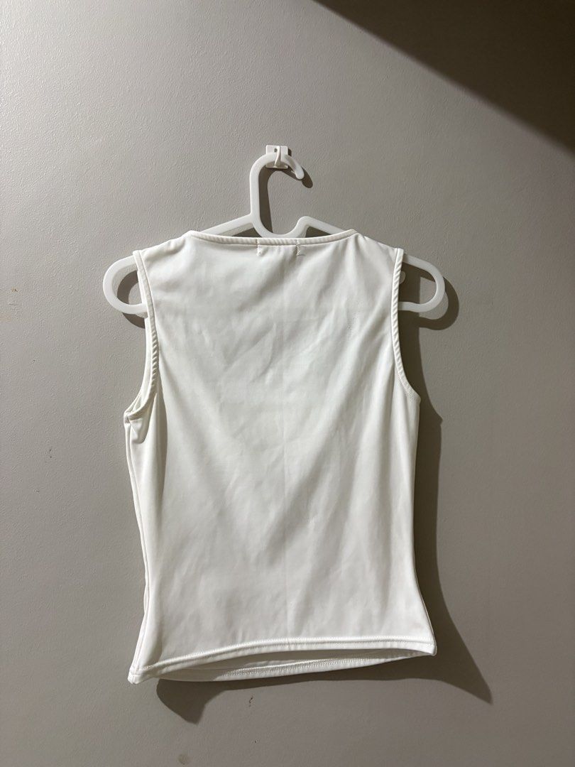 Augety Studio White Square Neck Tank Top (Category: Sleeveless) located in Quezon City. Submitted by kamtee (Listing ID 1431300928, Image 3). Description: Runs small/ tight fit.
