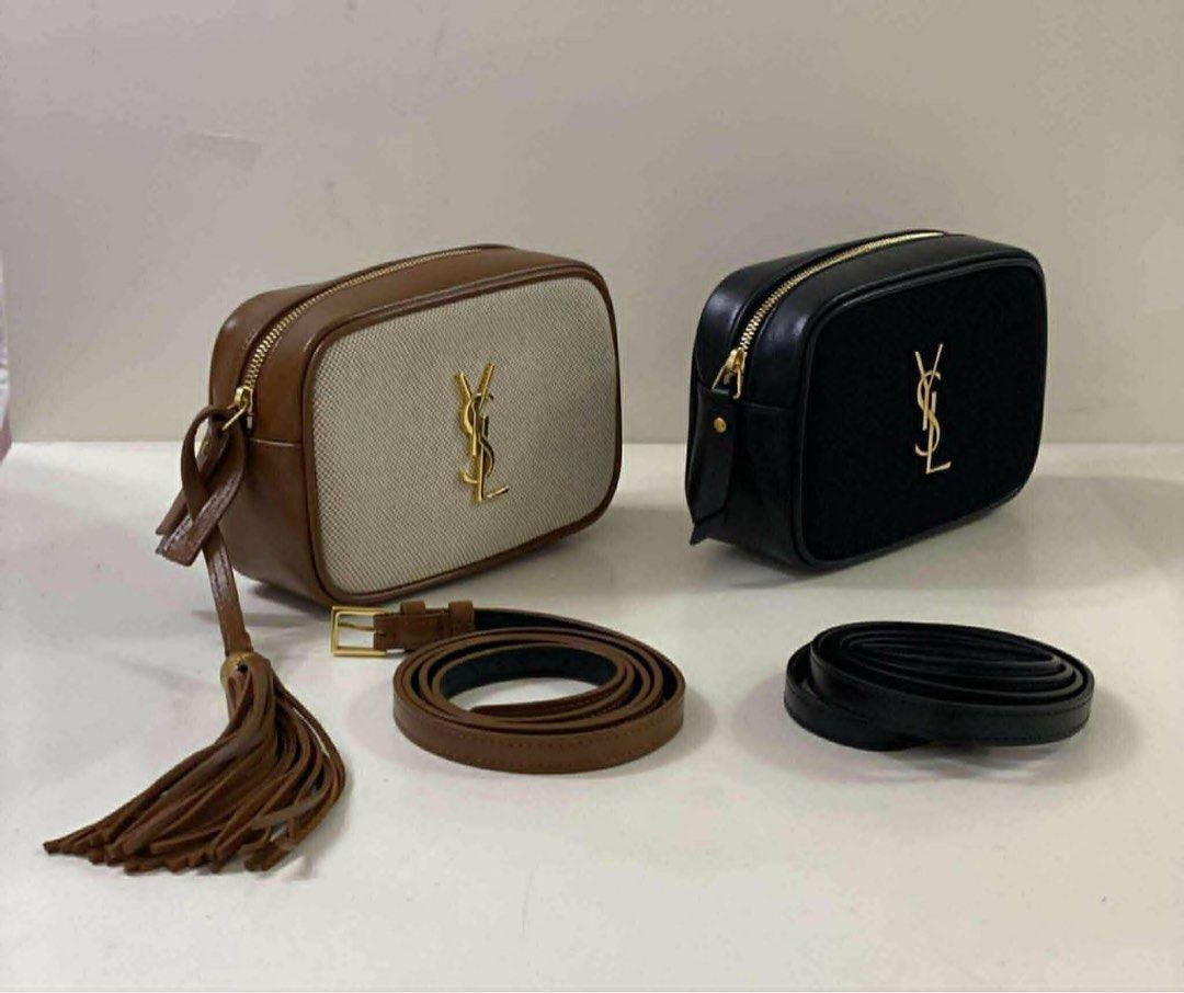 Authentic YSL Mini Lou camera bag (Category: Luxury Bags & Wallets) located in Makati City. Submitted by jabbegailmendoza (Listing ID 1431260226, Image 2). Description: 55,000 each Slightly negotiable In very good condition Black is velvet leather White the brown is canvas with both tassel detailing.