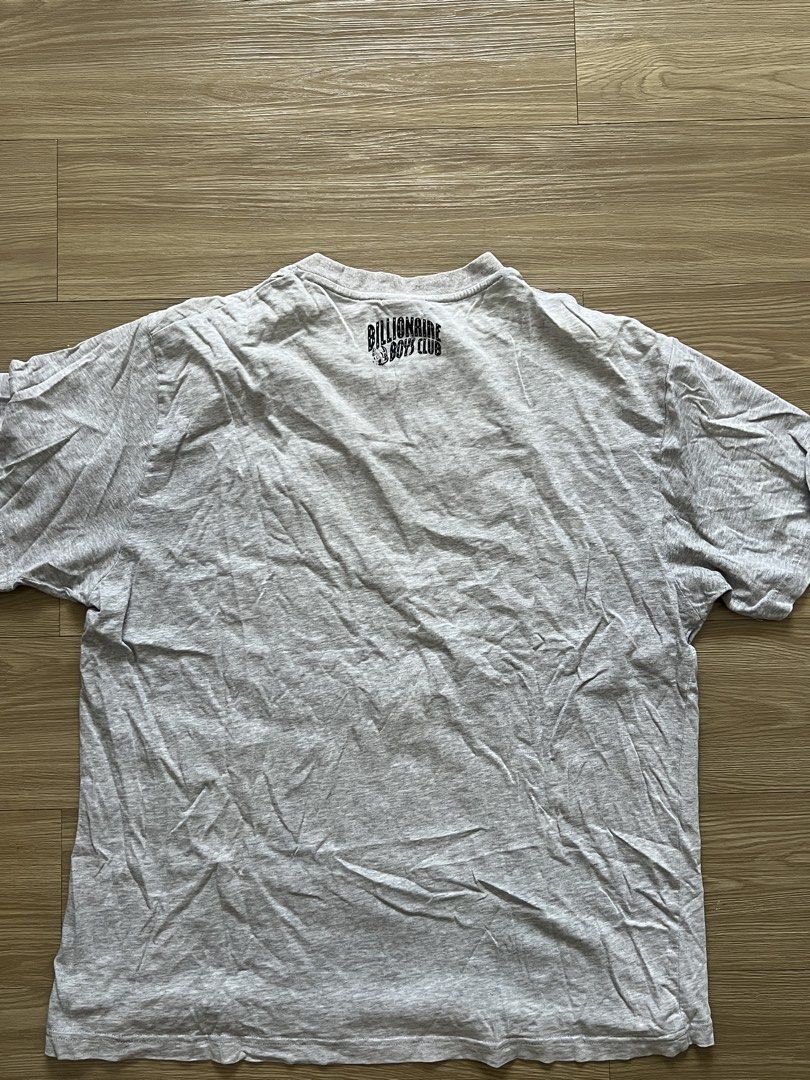 Billionaire Boys Club Graphic Tee (Category: Tshirts & Polo Shirts ) located in Quezon City. Submitted by joshsalangsang (Listing ID 1431252941, Image 2). Description: - Grey t-shirt - Unique graphic on the front - Billionaire Boys Club logo on the back - Classic crew neck style - Soft and comfortable fabric.