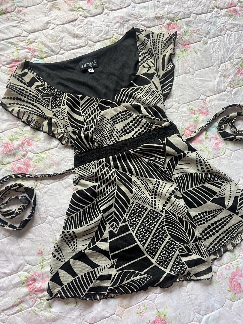 Black & White Blouse with waist tie (Category: Blouses) located in Quezon City. Submitted by mei_declutters (Listing ID 1431375891, Image 2). Description: brand: —— size: S-Semi L flaws: none.