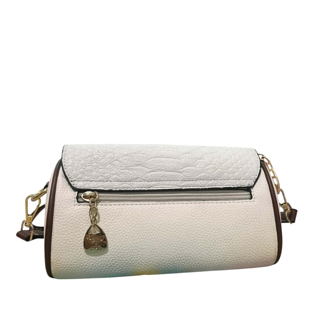 White mini micro barrel sling bag cross body (Category: Shoulder Bags) located in Kalibo. Submitted by blessful.collection (Listing ID 1431323003, Image 2). Description: loc: aklan.