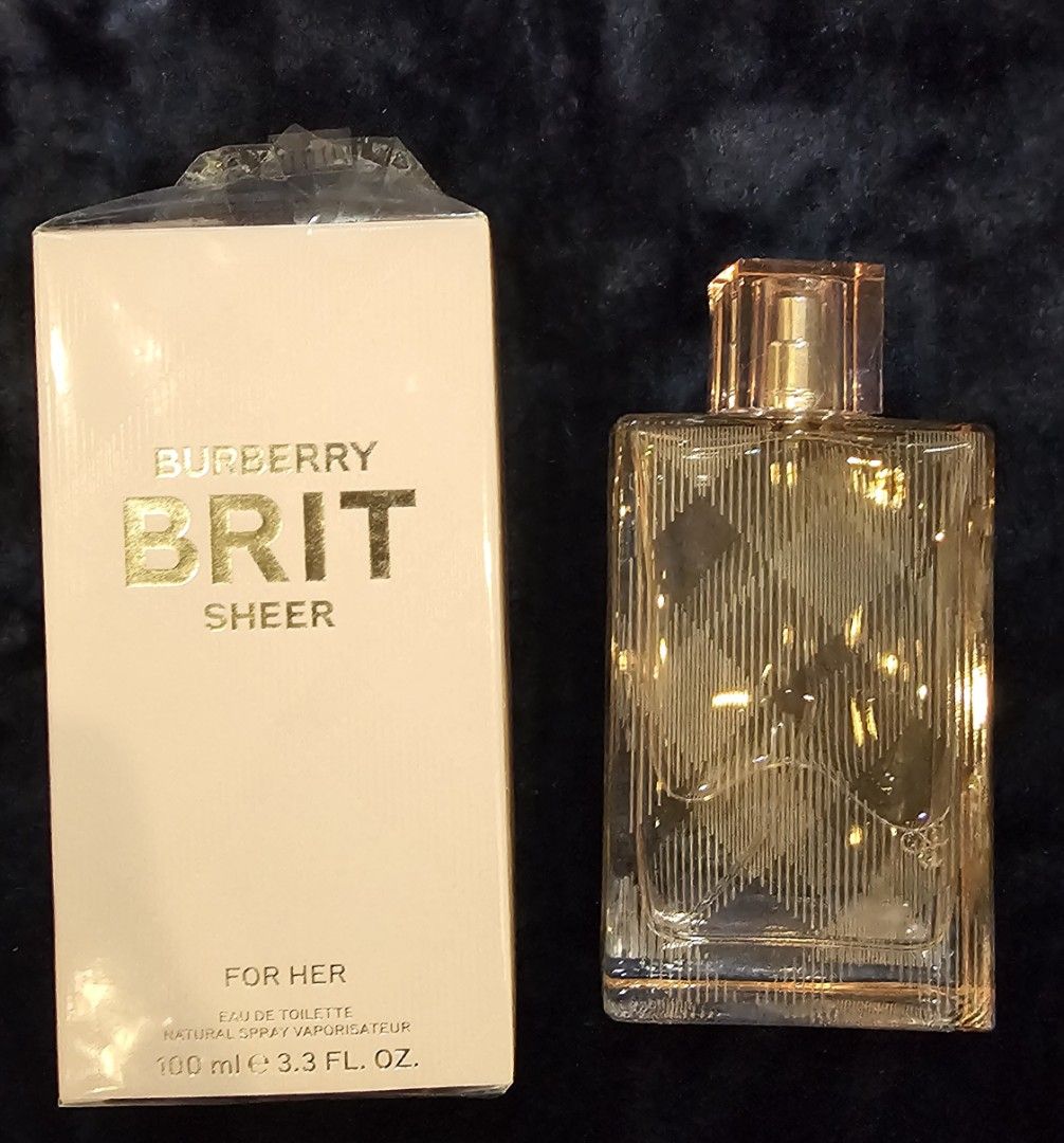 Burberry Brit Sheer Eau de Toilette 100ml (Category: Fragrance & Deodorants) located in Paranaque City. Submitted by pwincess_kween (Listing ID 1431349796, Image 1). Description: - Burberry Brit Sheer Eau de Toilette for women - 100 ml / 3.3 fl. oz. bottle - Includes original box - Light pink fragrance color - Features clear, patterned bottle design - Box displays Burberry logo and "Brit Sheer" fsm. .