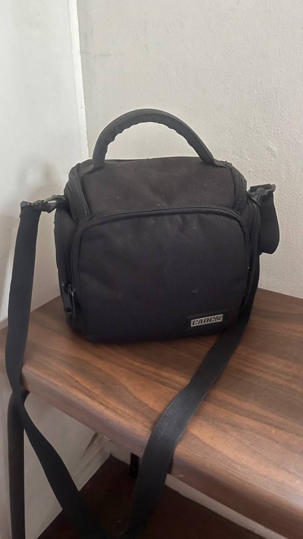 Caden Camera Bag (Category: Camera Bags & Carriers) located in Quezon City. Submitted by deily (Listing ID 1431303767, Image 2). Description: RFS: I have a new camera bag. Used this in college still sturdy. .