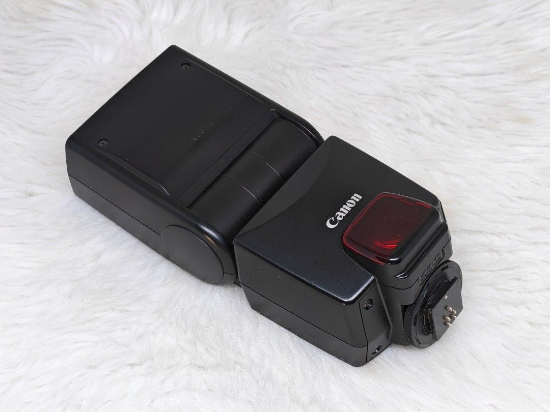 Canon Speedlite 380EX Flash (Category: Flashes) located in Manila. Submitted by ultimogizmos (Listing ID 1431230576, Image 1). Description: - Canon Speedlite 380EX flash - Features E-TTL for automatic flash control - Zoom settings to adjust flash coverage - Pilot light for previewing the flash - Includes a hot shoe mount for easy attachment - Black finish - Adjustable flash head.