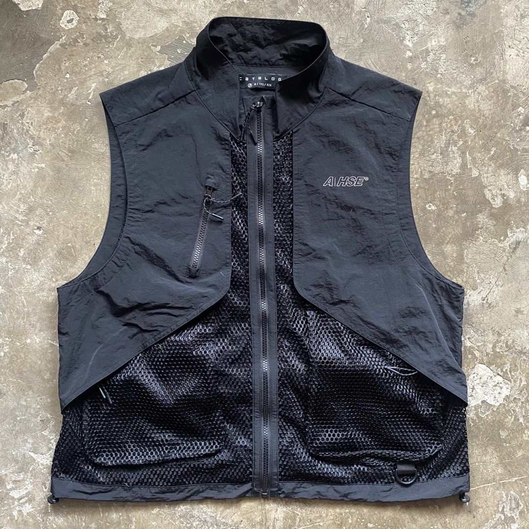 Catalog - A/HSE Mesh Shell Utility Boxy Vest (Category: Vests) located in Pasig City. Submitted by sound.racks (Listing ID 1431208952, Image 1). Description: Catalog - A/HSE Mesh Shell Utility Boxy Vest - Dimes:W23xL25 - Issue:none - Mint condition - Good for jogging and outdoor activities ₱800 +Shipping Fee.