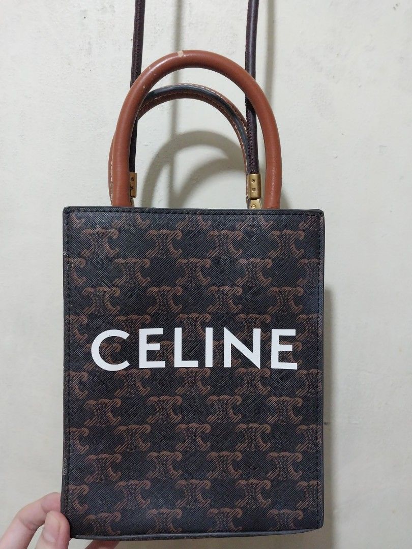 🌰Celine Vertical Cabas Tote Triomphe Mini Satchel (Category: Luxury Bags & Wallets) located in Manila. Submitted by PrinceDani.Clothing (Listing ID 1431231024, Image 2). Description: Celine vertical cabas tote triomphe bag 6.5in width 8in length stamp made in Italy issue: peeled handle see pic vg condition.