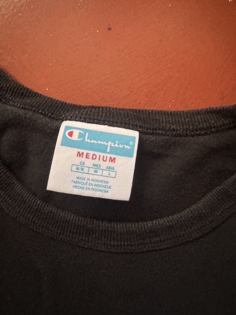 Champion T-shirt - Black - Medium (Category: Tshirts & Polo Shirts ) located in Manila. Submitted by vhhhhhhh (Listing ID 1431251856, Image 2). Description: - Champion t-shirt - Crew neck style - Size: Medium - Made in Indonesia - Features Champion logo on chest and sleeve.