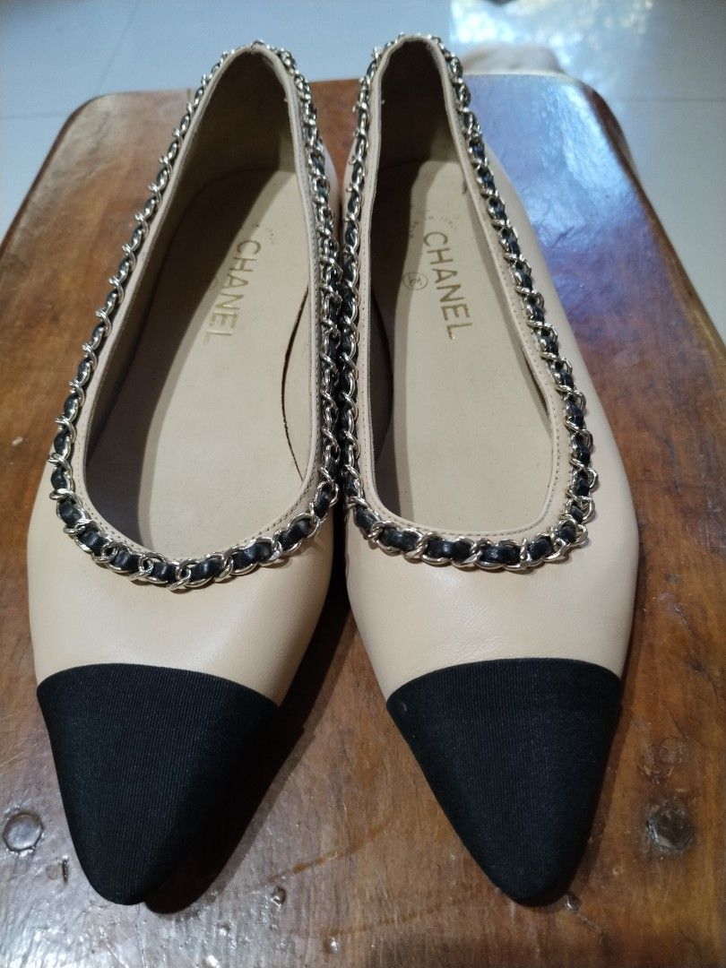 Chanel Cap Toe Chain Flats (Category: Flats & Sandals) located in Cebu City. Submitted by ginatangadut9347 (Listing ID 1431261871, Image 1). Description: - Chanel flats - Classic cap toe design - Beige leather upper - Black cap toe - Chain detail - Chanel logo on insole - Comfortable for everyday wear bought this item here in carousel for 6k, with flaw na when I bought it, overall item is still very nice, but I did not use it even once coz a bit 