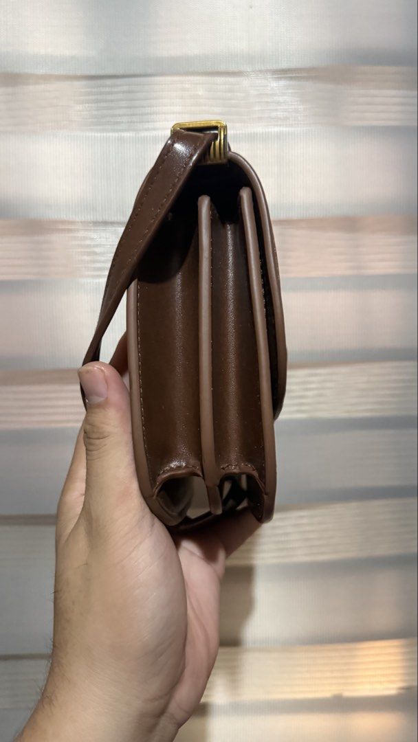 Charles and Keith Brown Charlot Bag (Category: Luxury Bags & Wallets) located in Calamba. Submitted by ashvault (Listing ID 1431273030, Image 3). Description: Charles and Keith Charlot Bag 2-way shoulder sling bag.
