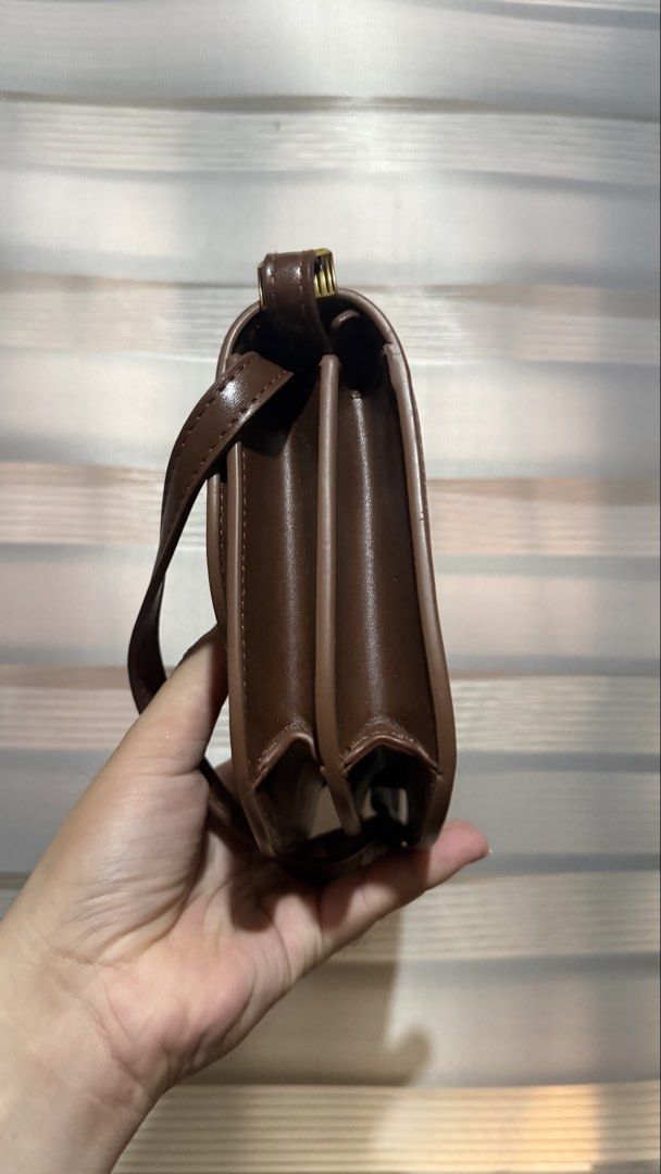Charles and Keith Brown Charlot Bag (Category: Luxury Bags & Wallets) located in Calamba. Submitted by ashvault (Listing ID 1431273030, Image 2). Description: Charles and Keith Charlot Bag 2-way shoulder sling bag.