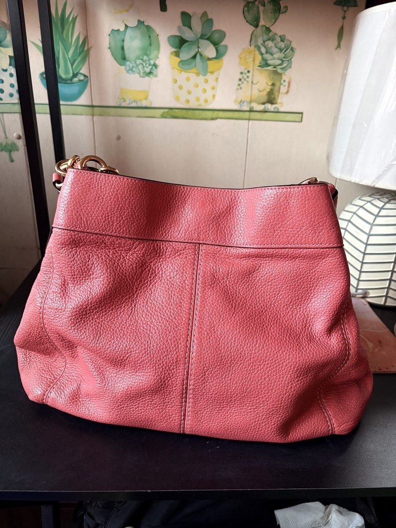 Coach Lexy Pebbled Shoulder Bag in Pink (Category: Luxury Bags & Wallets) located in Manila. Submitted by coopersunset (Listing ID 1431246529, Image 2). Description: Original price bough from seller: ₱5k ✔ Note: There are rubbings inside of the bag, specifically on the creed patch (see photo) ✔ Lightly used, well-maintained ✔ Soft, high-quality pebbled leather ✔ Classic and chic ✔ Three compartment that fits long wallet, phone, makeup pouch, etc.