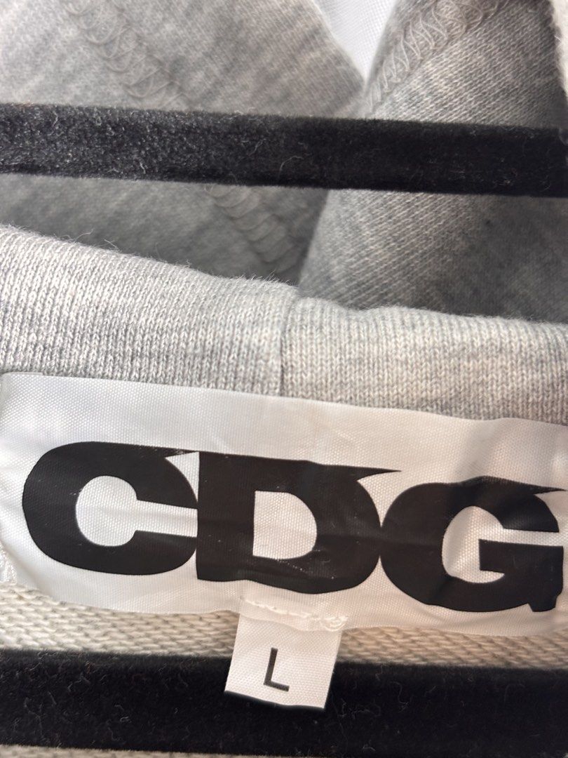 Comme Des Garçons x Better Gift Shop Hoodie (Category: Hoodies) located in Manila. Submitted by earlylifecrisis3 (Listing ID 1431327042, Image 2). Description: Sz Large Condition 9/10 Measure it by inch Width: 21 Length: 27 Shoulder: 22 Sleeve: 24 Bust: 20 Hem: 17 •Refund / Returns not allowed allowed •Please do check the dimensions size on labels sometimes are not accurate on the sizing •Ask me before purchasing.
