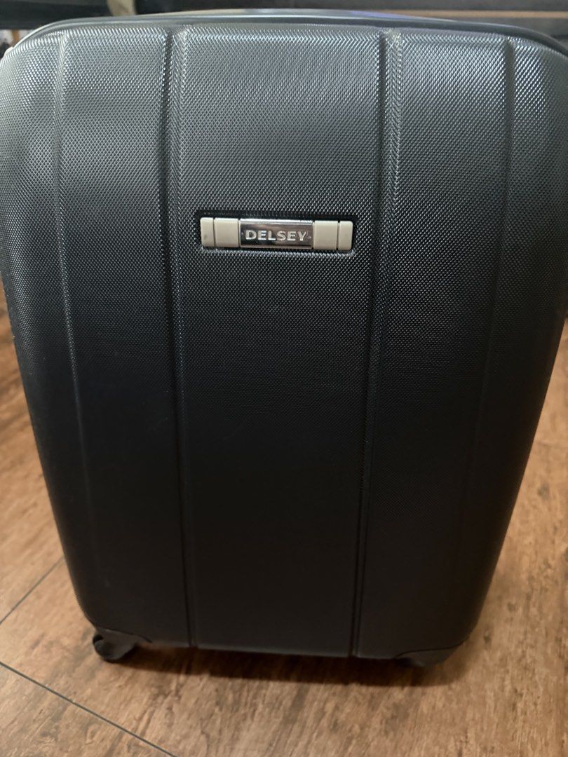 Delsey Luggage Suitcase (cabin size) (Category: Luggage) located in Pasig City. Submitted by mswise (Listing ID 1431268782, Image 1). Description: Im selling 2 identical for only 5k - Delsey carry-on suitcase - Color: Black - Textured exterior - Zipper closure - Side handle for easy carrying - Features the Delsey logo Note: handle to be replaced damaged in storage. Bags never been used. .