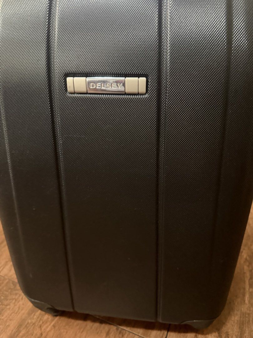 Delsey Luggage Suitcase (cabin size) (Category: Luggage) located in Pasig City. Submitted by mswise (Listing ID 1431268782, Image 3). Description: Im selling 2 identical for only 5k - Delsey carry-on suitcase - Color: Black - Textured exterior - Zipper closure - Side handle for easy carrying - Features the Delsey logo Note: handle to be replaced damaged in storage. Bags never been used. .