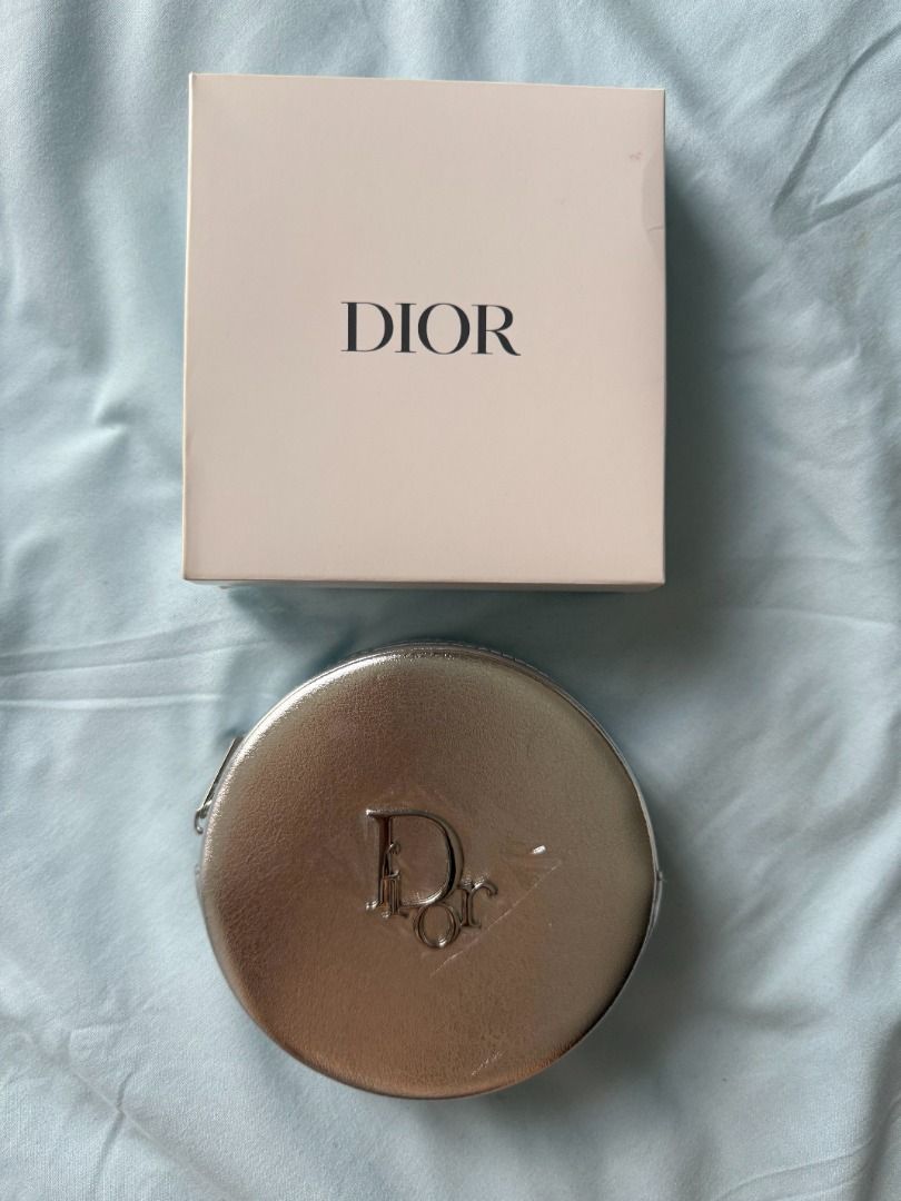Dior Silver Cosmetic Case - VIP Gift (Category: Luxury Bags & Wallets) located in Quezon City. Submitted by pigletguadalupe (Listing ID 1431226501, Image 1). Description: - Authentic Dior cosmetic case - Silver exterior - Zipper closure - Dior logo on front - Includes original white box.