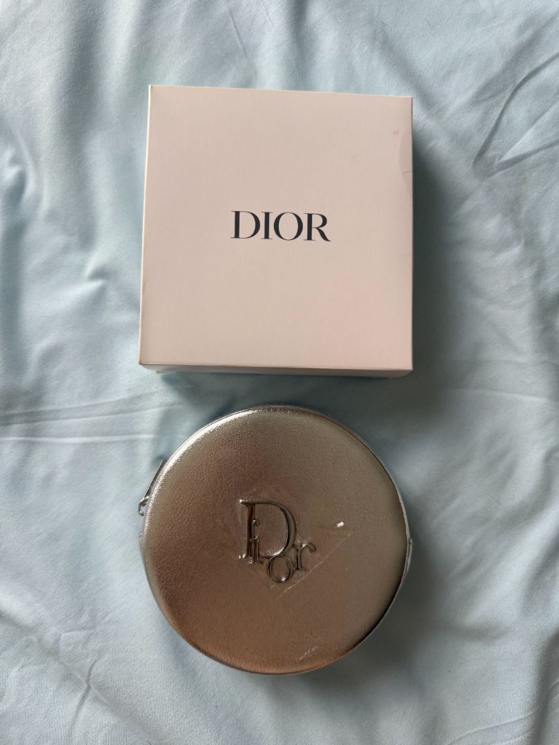 Dior Silver Cosmetic Case - VIP Gift (Category: Luxury Bags & Wallets) located in Quezon City. Submitted by pigletguadalupe (Listing ID 1431226501, Image 2). Description: - Authentic Dior cosmetic case - Silver exterior - Zipper closure - Dior logo on front - Includes original white box.