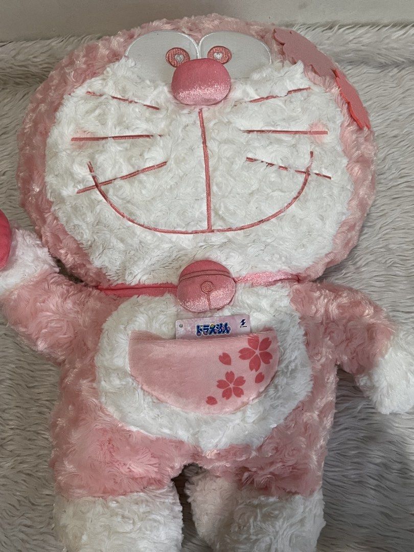 Doraemon Pink Sakura Edition Stuffed Toy Authentic from Japan (Category: Plushies & Soft Toys) located in Bacoor. Submitted by crystalsky_22 (Listing ID 1431376956, Image 3). Description: ❤️authentic po ito from Japan ❤️ nakatago lang, pero tanggal po ang paper tag ❤️ approx. 19 inches pag patayo ❤️ location/meet-up: Salinas 1 Bacoor or Pasig Ortigas or MRT Ortigas/Taft during weekdays only ❤️ lalamove/grab or J&T/LBC.