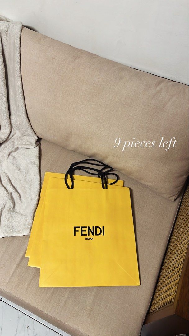 Fendi Paper Bag (Category: Luxury Bags & Wallets) located in Manila. Submitted by monicagellerbing__ (Listing ID 1431313380, Image 1). Description: - Authentic Fendi paper bag - Features the Fendi logo in black - Stylish yellow color - 9 pieces in stock - Ideal for gifting or collecting - A must-have for Fendi fans.