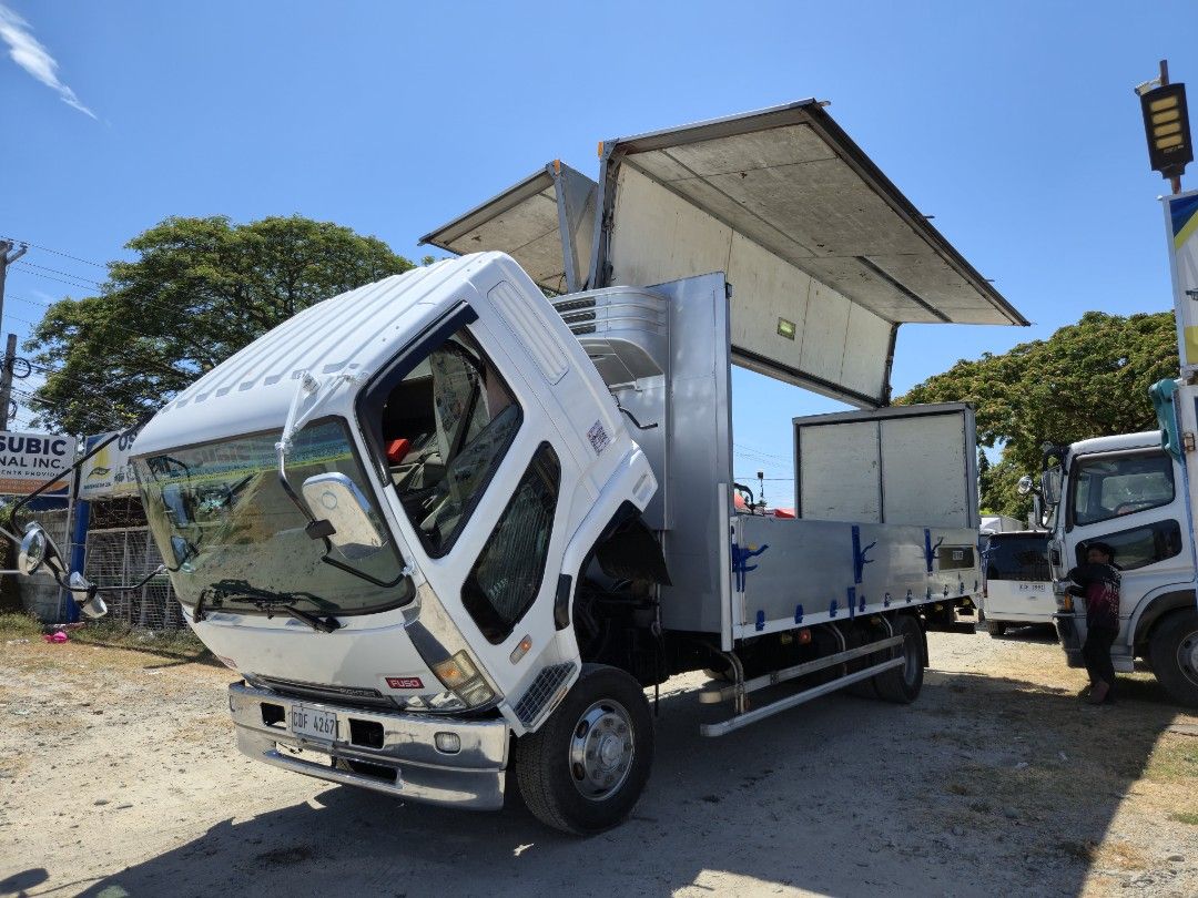 FUSO FIGTHER WINGVAN 6M60 (Category: Heavy Vehicles) located in Manila. Submitted by samansubic (Listing ID 1431187861, Image 2). Description: FUSO FIGHTER WINGVAN, 6M60, 8STUD, 22ft, 2025 year model. Japan Surplus Trucks for sale. Osaka Subic International Inc. Jasa Road, Purok 2, Concepcion, Lubao, Pampanga. For inquiries: call or message 09199977999/09177799955. We accept: Cash/Bank Financing..