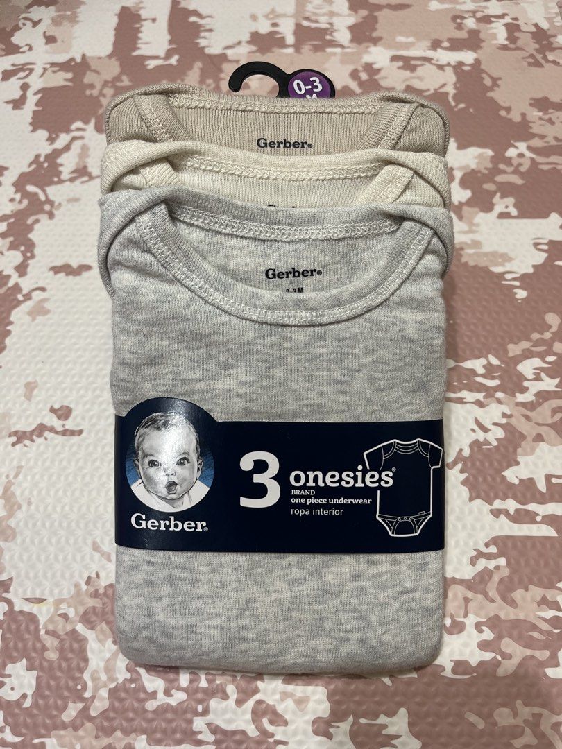 Gerber 3-Piece Onesies 0-3 Months (Category: Babies & Kids Fashion) located in Quezon City. Submitted by prettydollph (Listing ID 1431301019, Image 1). Description: - New Gerber onesies for babies (0-3 months) - Pack includes three onesies - Neutral colors - One-piece underwear design - Ideal for newborns and infants - Made by Gerber, a trusted baby brand.