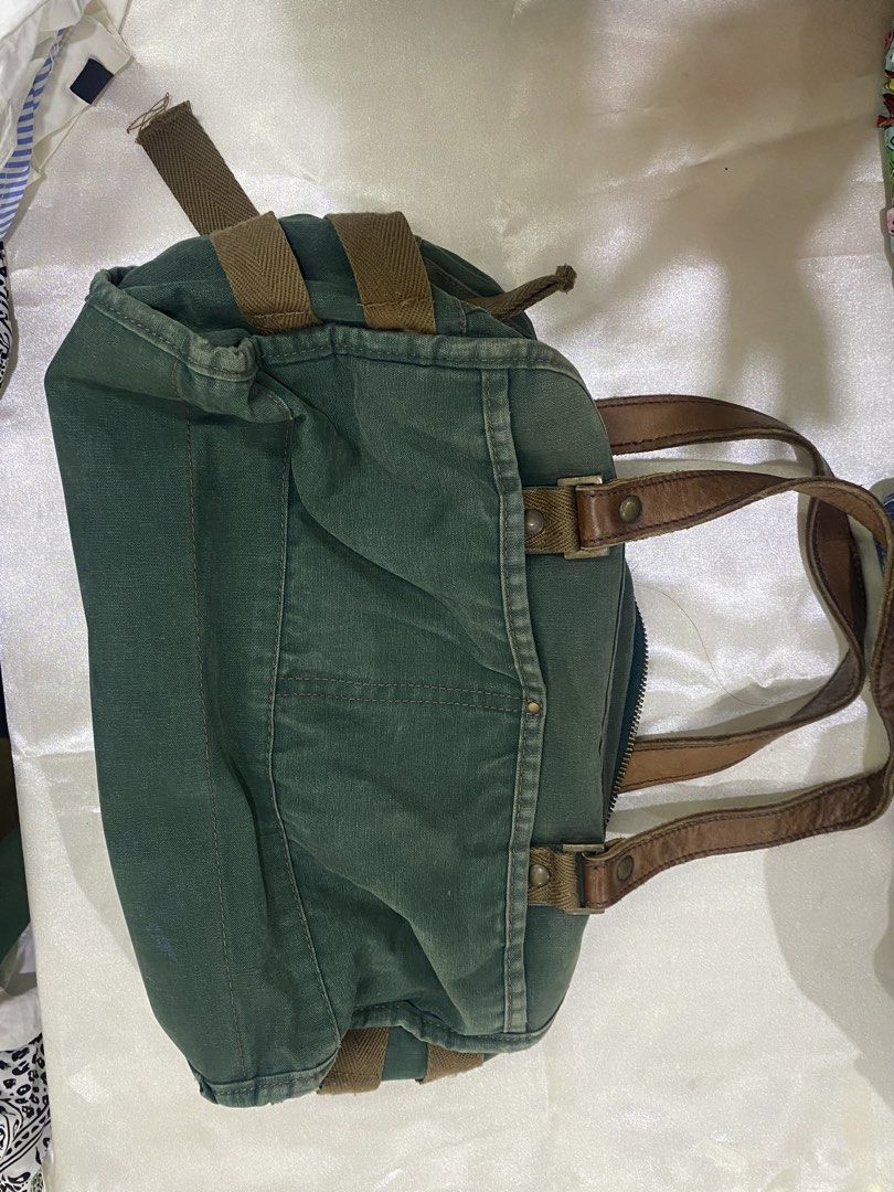 Green Y2k Thursday Island Shoulder Bag (Category: Shoulder Bags) located in Bacolod City. Submitted by sheezhbratzified (Listing ID 1431229024, Image 2). Description: Very cute army green shoulder bag✨ For school/everyday use. Mode of payment: Gcash 💰.