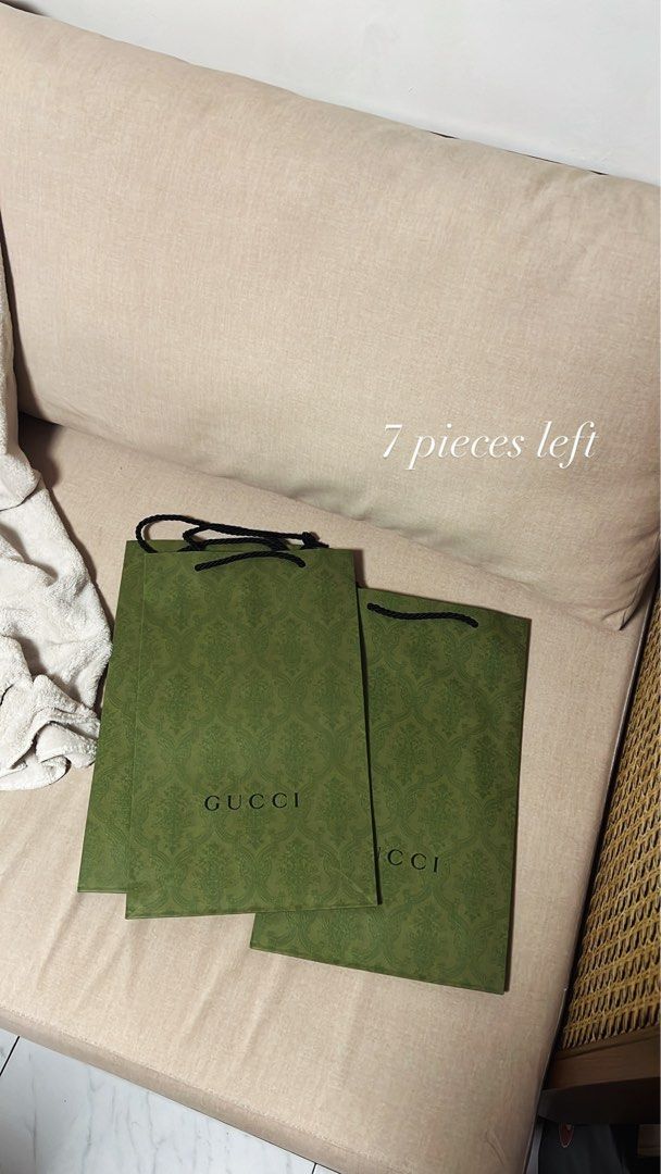 Gucci Paper Bag (Category: Luxury Bags & Wallets) located in Manila. Submitted by monicagellerbing__ (Listing ID 1431311060, Image 1). Description: - Authentic Gucci paper bags - Features the iconic Gucci logo and pattern - Green color - Perfect for gifting or collecting - 7 pieces available.