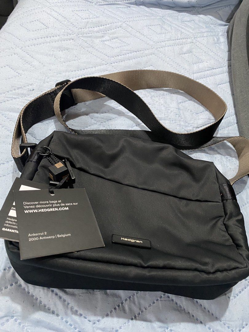 Hedgren Nova Neutron Black (Brand new) (Category: Cross-body Bags) located in Quezon City. Submitted by davenue (Listing ID 1431284605, Image 1). Description: Brand new Hedgren Neutron crossbody in black 🖤 Unused, no issues. Compact but fits daily essentials (phone, wallet, keys, etc). Lightweight and comfortable—great for everyday use 👍 ✔ Water-resistant ✔ Multiple pockets (front, back, inside) ✔ Adjustable strap (Comes with bag only no packag