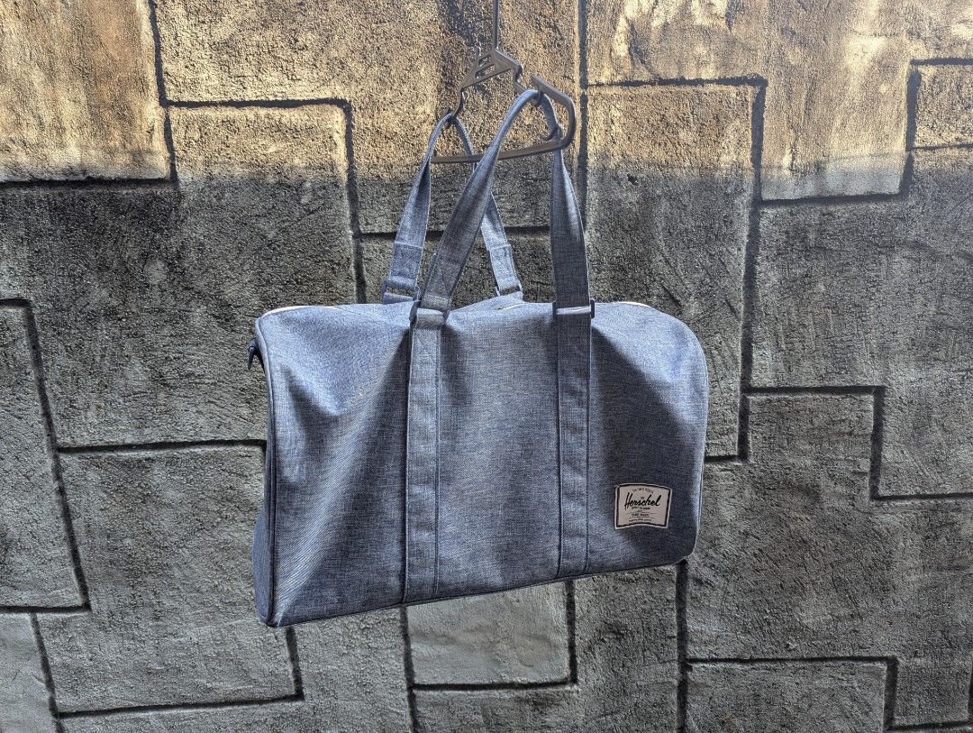 Herschel Novel Duffle Bag (42.5L) (Category: Sling Bags) located in San Fernando. Submitted by jit.things28 (Listing ID 1431313467, Image 1). Description: Herschel Novel Duffle Bag 42.5L - Has a shoe compartment and shoulder strap. - Newly Cleaned. Price is negotiable for sure buyers. .