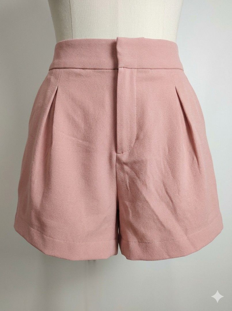 Highwaist pleated shorts (Category: Shorts) located in Makati City. Submitted by krishtyle (Listing ID 1431257687, Image 1). Description: Personal preloved (decluttering) Never worn,washed (gifted) Manual measurement : W28in (Size 38 on tag) with inner lining 📍Makati Message for inquiry and faster transaction.