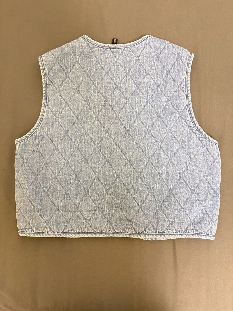 H&M Quilted Denim Tie Vest (Category: Coats, Jackets and Outerwear) located in Makati City. Submitted by rinadeclutters (Listing ID 1431325492, Image 2). Description: 💌 Please message before buying! - brand: H&M - colour: two toned denim (lighter outside, darker on the inside) - quilted material - tie front vest - size: XS 💰 MOP: GCash or bank transfer 📦 Shipping fee will be shouldered by buyer.