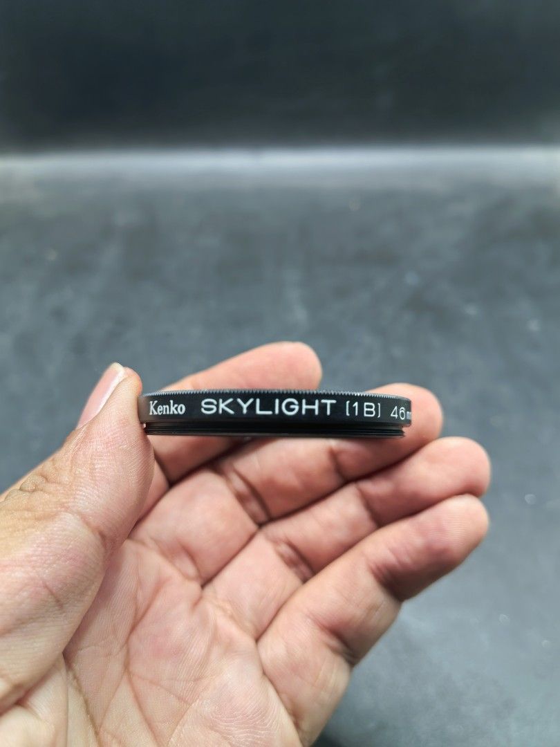 Kenko MC Skylight 1B 52mm Camera Lens filter (Category: Lens & Kits) located in Cebu City. Submitted by dudes_villanueva (Listing ID 1431202537, Image 2). Description: Kenko MC Skylight 1B 52mm Camera Lens filter. 📌 Function: Designed to reduce excessive bluishness in outdoor color photography and acts as a protective layer for the camera lens. 📌 Size: Features a 52mm thread diameter. 📌 Type: Multi-Coated (MC) Skylight 1B filter. 📌 In excelle