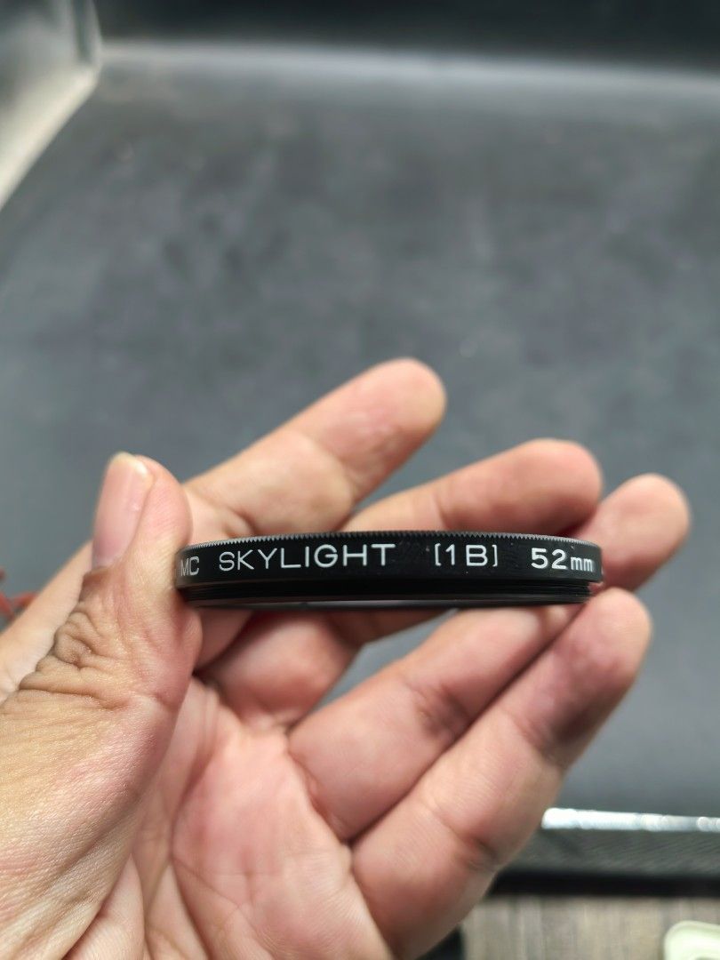 Kenko MC Skylight 1B 52mm Camera Lens filter (Category: Lens & Kits) located in Cebu City. Submitted by dudes_villanueva (Listing ID 1431203317, Image 2). Description: Kenko MC Skylight 1B 52mm Camera Lens filter. 📌 Function: Designed to reduce excessive bluishness in outdoor color photography and acts as a protective layer for the camera lens. 📌 Size: Features a 52mm thread diameter. 📌 Type: Multi-Coated (MC) Skylight 1B filter. 📌 In excelle
