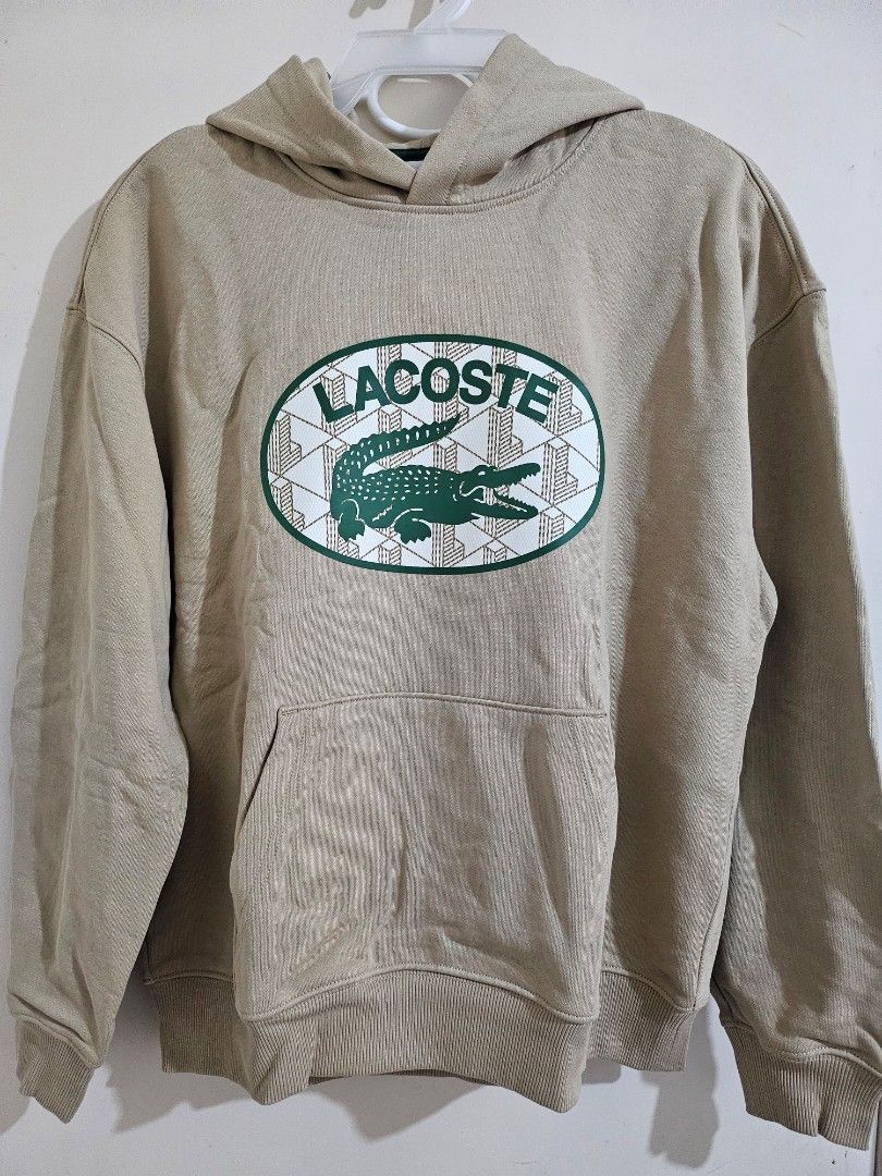 Lacoste Loose Fit Hoodie (Category: Hoodies) located in Manila. Submitted by aituy (Listing ID 1431286905, Image 1). Description: ✅️ Onhand ready to ship ✅️ Original and authentic ✅️ US bought ✅️ Brand new with tag • Size : Size 4 (Medium) only • Fit : Loose Fit • Dimensions : 25" X 26" • Color : beige • Material : 100% cotton • Can be worn unisex ⚠️‼️SALE PRICE : P3,400‼️⚠️ 📍 Location: Sta. Cruz, Manila ✔️ MOP: Bank Transfer, GCash or Paymaya o