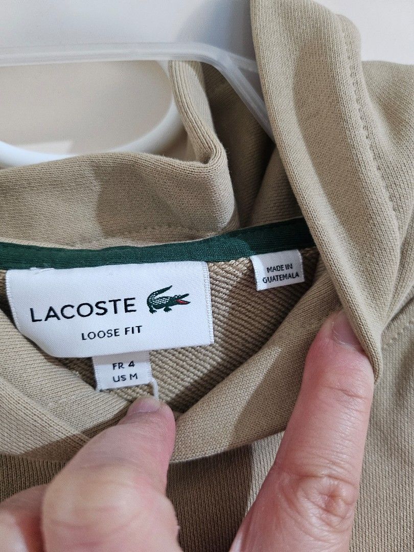 Lacoste Loose Fit Hoodie (Category: Hoodies) located in Manila. Submitted by aituy (Listing ID 1431286905, Image 3). Description: ✅️ Onhand ready to ship ✅️ Original and authentic ✅️ US bought ✅️ Brand new with tag • Size : Size 4 (Medium) only • Fit : Loose Fit • Dimensions : 25" X 26" • Color : beige • Material : 100% cotton • Can be worn unisex ⚠️‼️SALE PRICE : P3,400‼️⚠️ 📍 Location: Sta. Cruz, Manila ✔️ MOP: Bank Transfer, GCash or Paymaya o