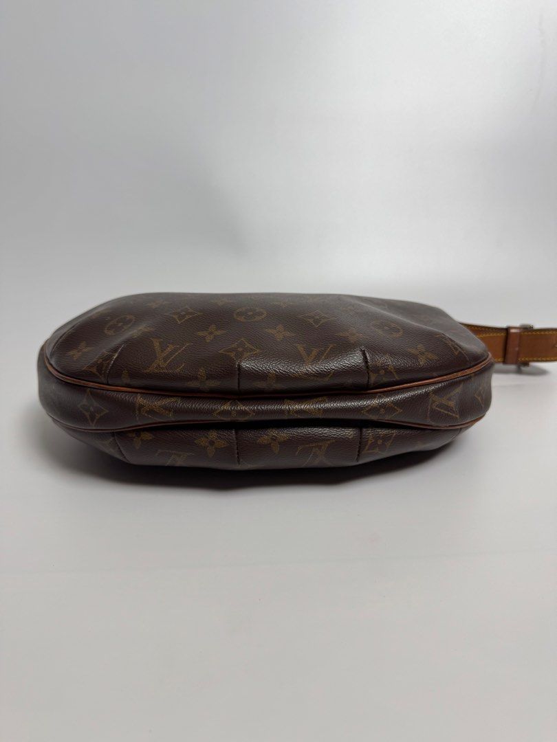 Louis Vuitton Monogram Croissant Bag (Category: Luxury Bags & Wallets) located in Cavite. Submitted by loadeadgears (Listing ID 1431341105, Image 3). Description: - Louis Vuitton shoulder bag - Classic Monogram canvas - Brown leather strap with buckle - Red fabric interior lining - Interior pocket - Gold-tone zipper pull - Made in France.
