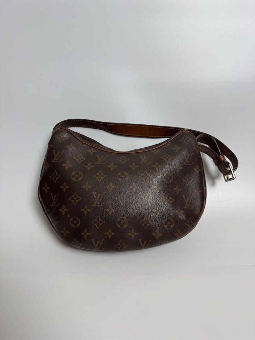 Louis Vuitton Monogram Croissant Bag (Category: Luxury Bags & Wallets) located in Cavite. Submitted by loadeadgears (Listing ID 1431341105, Image 2). Description: - Louis Vuitton shoulder bag - Classic Monogram canvas - Brown leather strap with buckle - Red fabric interior lining - Interior pocket - Gold-tone zipper pull - Made in France.