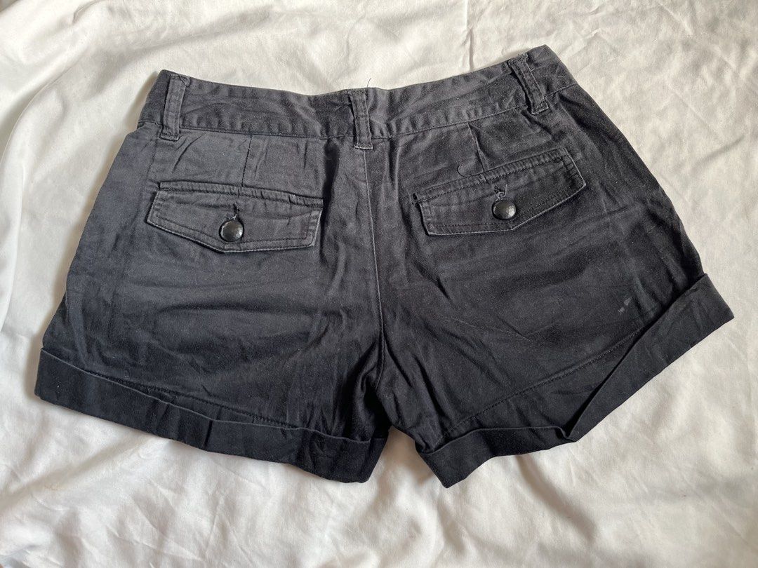 Mid-Low Rise Black Soft Denim Shorts (Category: Shorts) located in Quezon City. Submitted by dawn_iii (Listing ID 1431183295, Image 3). Description: Black shorts with a button closure and two back pockets. The shorts have a folded hem. The waist measures approximately 13 inches across. Waistline - 25-26🤍.