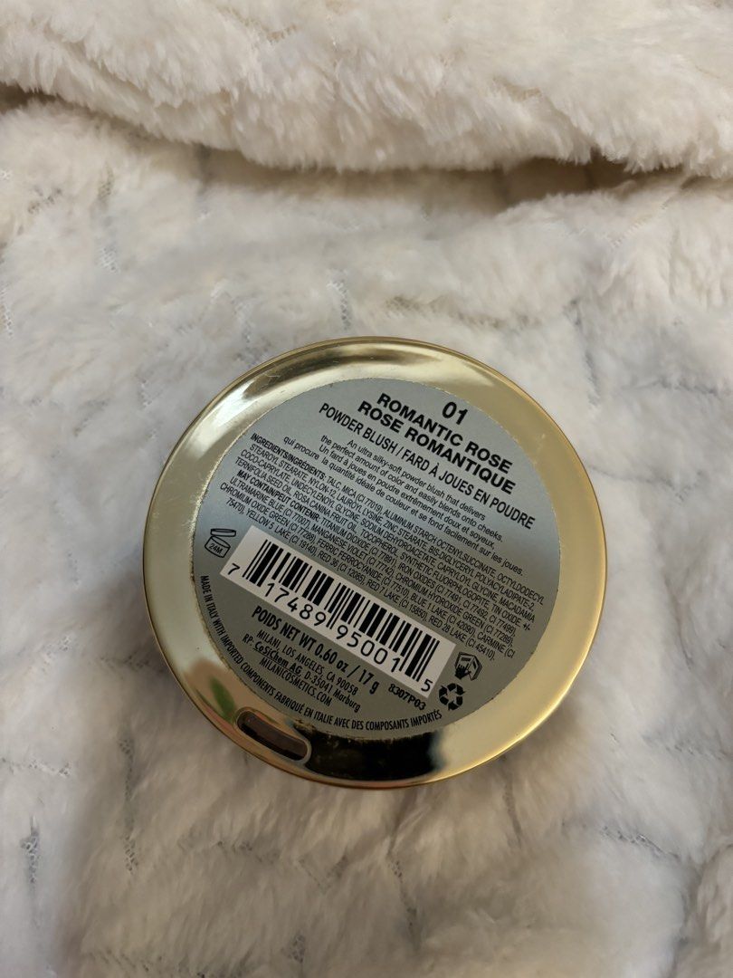 Milani Romantic Rose Powder Blush (Category: Makeup) located in Taguig. Submitted by hisandhers16 (Listing ID 1431346585, Image 3). Description: Authentic. Good as new. Swatched only. See pics. - Milani Romantic Rose Powder Blush in shade 01 - Features a beautiful rose design - Housed in a round compact with a clear lid - Warm, neutral tone - Product details (ingredients, weight) are on the back.