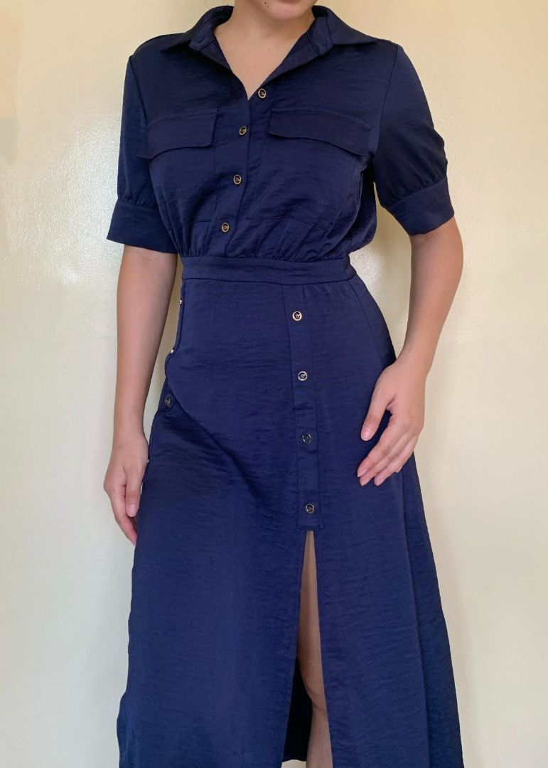 navy blue button-down midi dress with double slits (Category: Dresses) located in Pasig City. Submitted by buyfromrubyjane (Listing ID 1431214145, Image 3). Description: - fits SMALL to MEDIUM comfortably - collared neckline with button-down front (top portion) - midi length with double front slit details for ease of movement - concealed side zipper for easy wear - lightweight, breathable fabric with a good-quality feel classic navy blue — easy t
