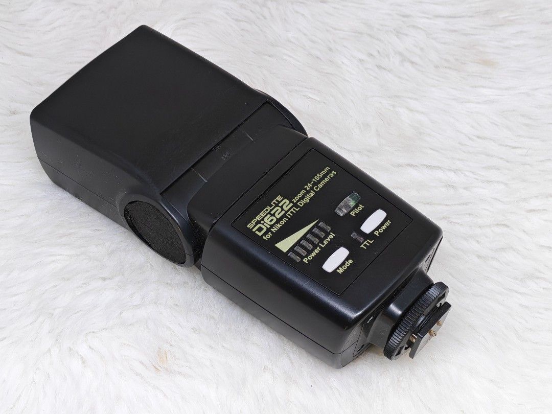 Nissin Di622 Digital Flash for nikon (Category: Flashes) located in Manila. Submitted by ultimogizmos (Listing ID 1431230920, Image 2). Description: - Nissin Di622 flash unit - Compatible with Nikon i-TTL digital cameras - Features: - Power level indicator - Mode selection - TTL power settings - Includes a red filter - Hot shoe mount for easy attachment.
