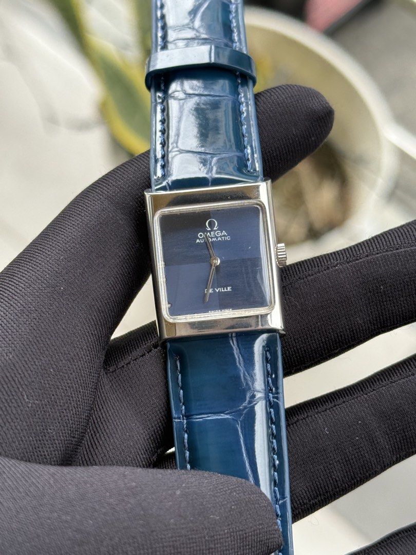Omega De Ville Tank (Category: Luxury Watches) located in Quezon City. Submitted by mjgorobat15 (Listing ID 1431206277, Image 3). Description: Omega De Ville Tank •Reference no. ST 511.0427 •Year production 1972-1975 •Movement: Manual Wind Caliber 620 •Case: Stainless steel •Case size: 23mm •Blue checkered dial •Service History: February 2026 •Bracelet: New AM genuine leather •Inclusions: Watch and presentation box only •Condition: 9/10.