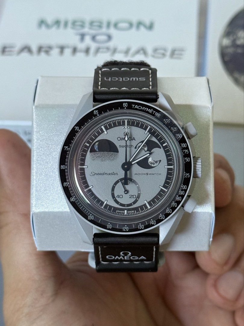 Omega x Swatch Earthphase Grey Moonphase (Category: Luxury Watches) located in Marikina City. Submitted by mimayuy (Listing ID 1431196617, Image 1). Description: Condition: Brand New with 2 year swatch warranty Card (Purchased Date:2026) Below Srp ₱21,300! DM me for more photos and legit transaction! Thank you.