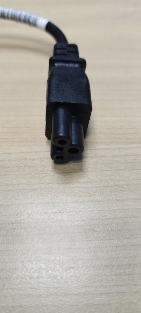 Power Cable with UK Plug (Category: Cables & Adaptors) located in Marikina City. Submitted by nvm32015 (Listing ID 1431329620, Image 3). Description: - Black power cable - UK plug - 3-pin connector - Suitable for various devices.
