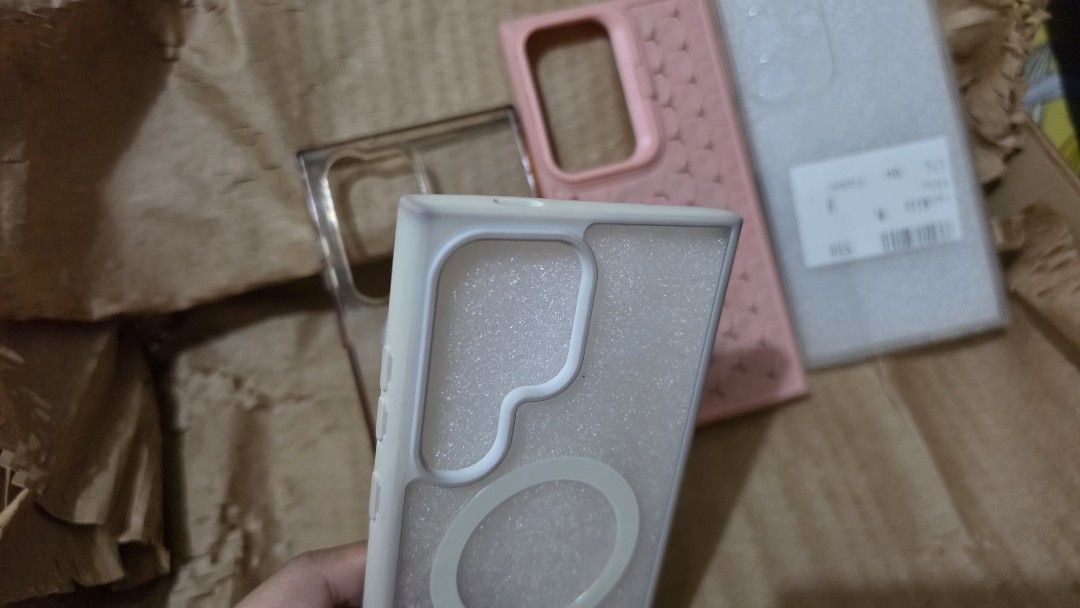 S24U Phone Cases Pre-loved (Category: Cases & Sleeves) located in Bulacan. Submitted by sunflwr (Listing ID 1431267050, Image 2). Description: ‼️FOR SALE‼️ for S24 Ultra only For only Php 150 Take all w the phone cases - Full transparent (new) - Pink (Used only once) All cases are in good condition; Used but not abused. Expect discoloration, scratches, or dents. 📍Bulacan.