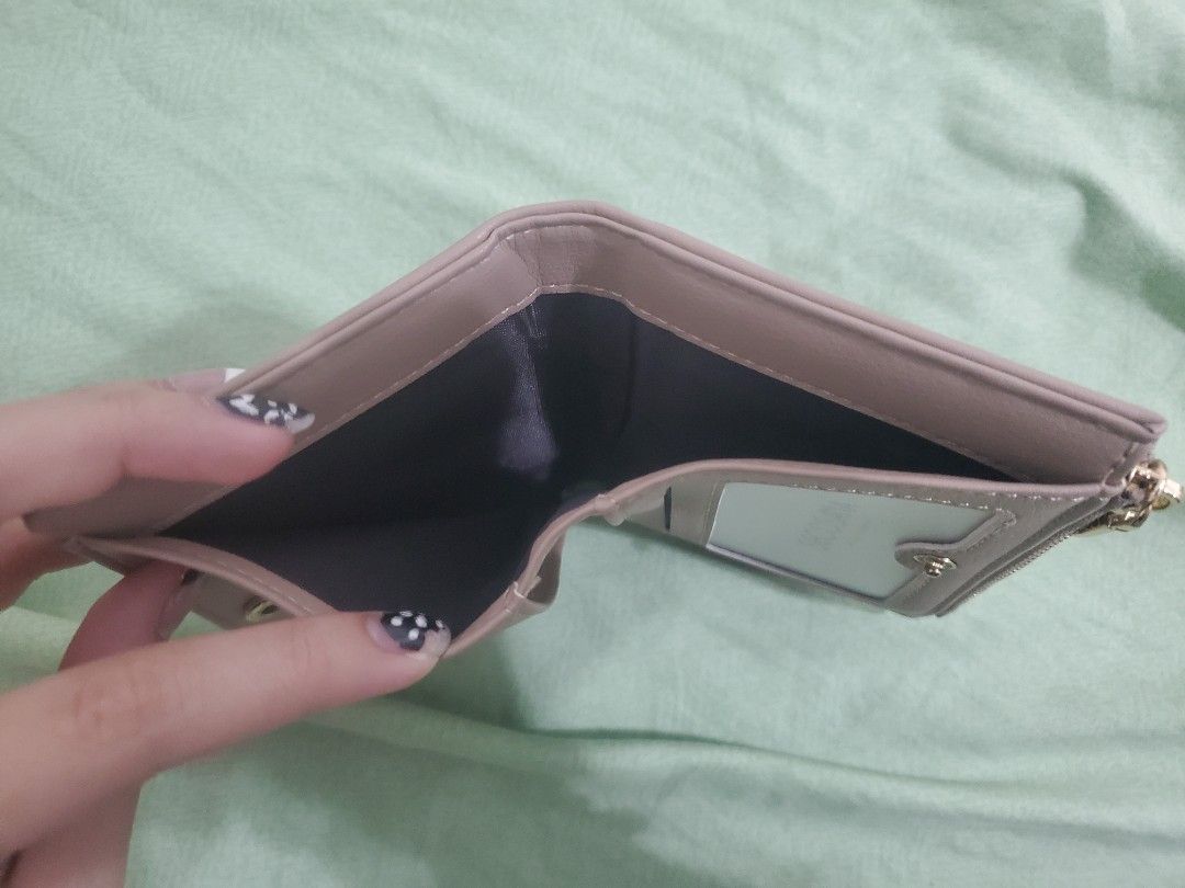 Secosana Wallet (Category: Wallets & Card holders) located in Cavite. Submitted by sameoreo (Listing ID 1431289865, Image 3). Description: PHP200 - not including sf loc: bacoor, cavite mop: gcash - payment first mod: lalamove/j&t - buyer book and shoulder sf NOTE: color may appear diff due to lighting, can pm for more pics pm if interested !!𓂃ෆ˚ can send more pics in pm "For we walk by Faith, not by sight." 2 Corinthians 5:7.