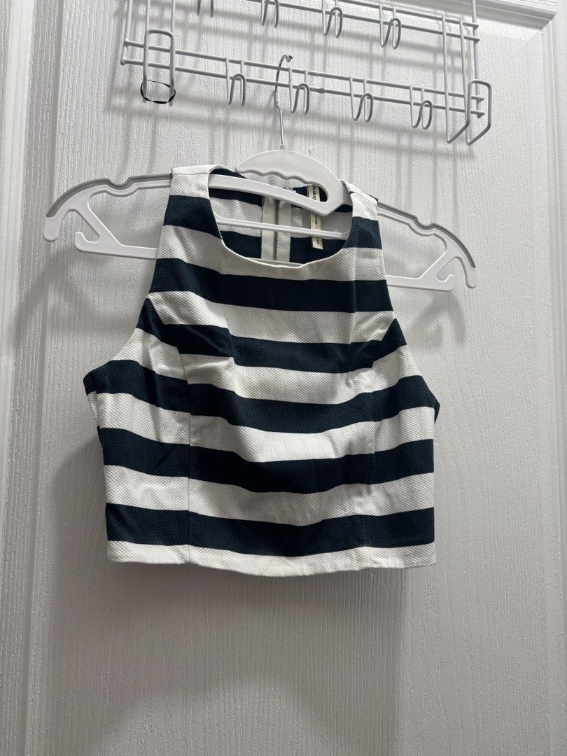 Stradivarius Nautical Stripe Crop Top (Category: Others Tops) located in Makati City. Submitted by declutterwithmeeeee (Listing ID 1428596514, Image 1). Description: Stradivarius top with classic navy and white horizontal stripes. Features a back zipper for easy wear. Worn only once, in excellent condition..