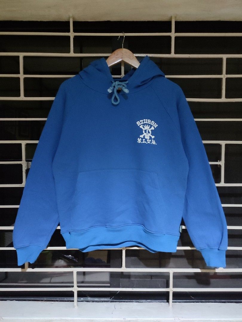 Stussy Gear Hoodie (Category: Hoodies) located in Antipolo. Submitted by thriftedjames (Listing ID 1431332353, Image 1). Description: - Stussy Gear hoodie - Color: Blue - Size: M - Design: Front logo and skull graphic on the back - Features: Drawstring hood and kangaroo pocket - Material: Comfortable - Style: Casual and versatile.