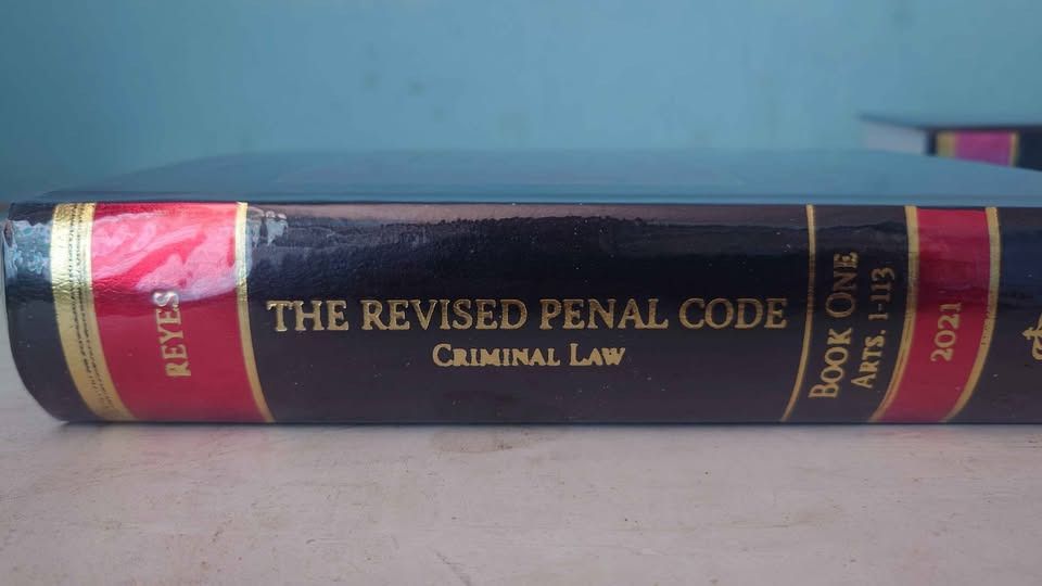 The Revised Penal Code Book One 2021 LUIS B REYES (Category: Textbooks) located in Paranaque City. Submitted by safegem_4a4bd2 (Listing ID 1431194265, Image 1). Description: Book is titled "The Revised Penal Code Criminal Law Book One Arts. 1-113 2021". It is authored by Reyes. The book has a black cover with gold lettering and red accents. For LALAMOVE: GCash payment accepted first Lalamove (same day delivery within Metro Manila, provide your ow