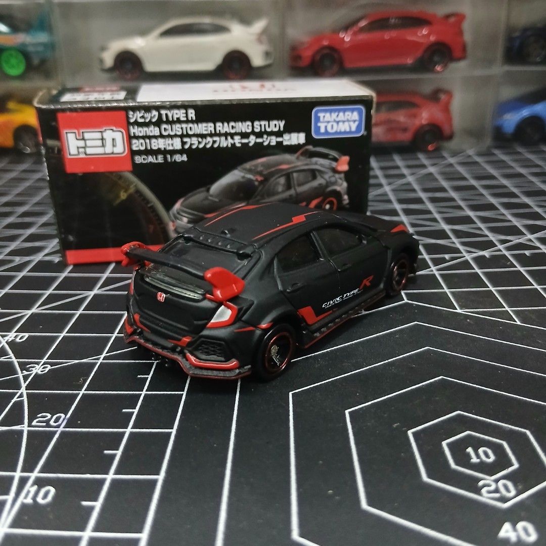 Tomica Honda Civic Type R 2018 Customer Racing Study (Category: Vehicle & Diecast Models) located in Tanauan. Submitted by jeuskingz (Listing ID 1431365693, Image 2). Description: - Tomica Honda Civic Type R (2018) diecast model - Color: Black with red accents - Scale: 1/64 - Includes original box - Condition: Mint 5PCS AVAILABLE 📍Tanauan Batangas (Meetup) Cash/Gcash 📍 Alabang by Sched (MINE NOW PAY NOW) 📦Also do shipping and lalamove (Buyer w