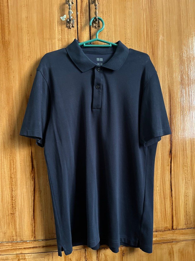 Uniqlo Polo Shirt (Category: Tshirts & Polo Shirts ) located in Quezon City. Submitted by johnrovic06 (Listing ID 1431201100, Image 2). Description: For sale Uniqlo Polo shirt (navy blue) 9.8/10 color rate 20x28 📍QC Issue: Pinhole RFS: Declutter.